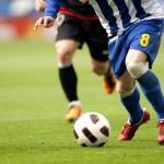 playerDribblingSoccerBall