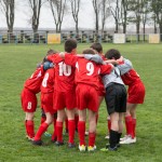 soccerPlayersHuddle