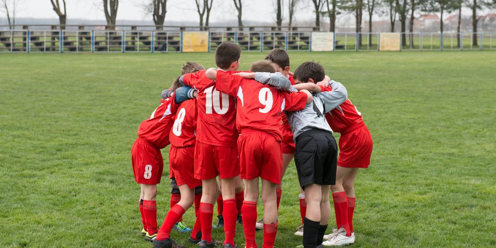 soccerPlayersHuddle