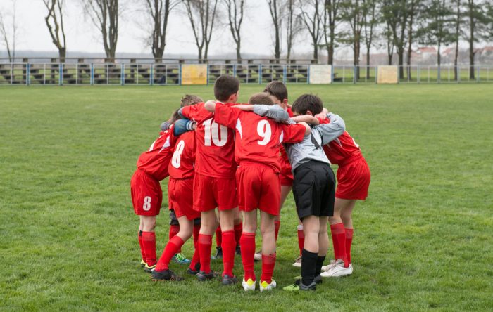 soccerPlayersHuddle
